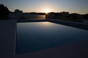 Small swimming pool at sunrise