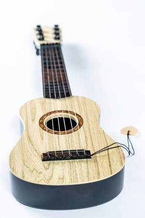 Small wooden guitar