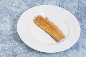 Smoked Mackerel fish on the white plate