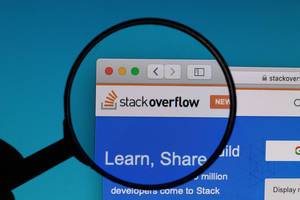 Stack Overflow logo under magnifying glass