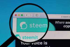 Steemit logo under magnifying glass