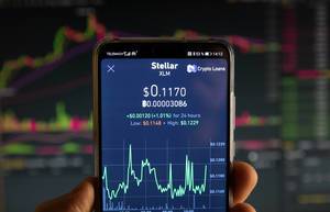 Stellar cryptocurrency price graph chart on mobile phone screen