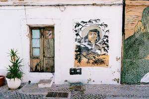 Street painting of a black woman in Faro, Portugal / Straßenmalerei einer schwarzen Frau in Faro, Portugal