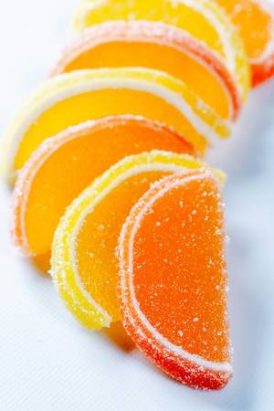 Sugar marmalade in the form of slices of orange and lemon