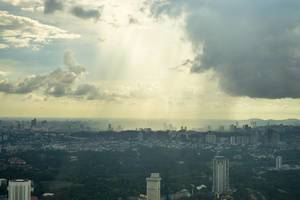 Sunbeams shining through Clouds in Kuala Lumpur