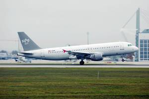 Sundair airplane taking off from Munich Airport