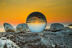 Sunset reflection in a glass ball