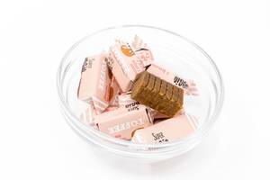 Super Fudgio - vegan caramel candy with toffee flavour dairy free in a glas bowl