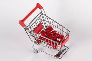 Sweet cherries in shopping cart