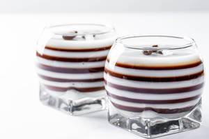 Sweet dessert with many layers of white and brown jelly