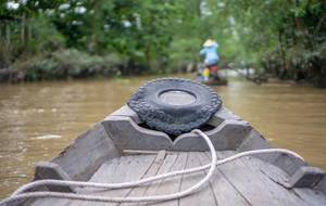 Taking a Boat Ride through the Jungle of the Mekong Delta in Vietnam