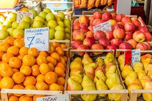 Tangerines, apples and pears on marketplace