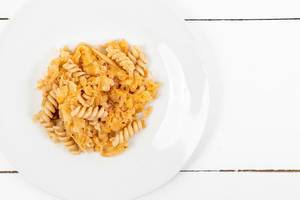 Tasty Pasta with Sauerkraut above white background (Flip 2020)