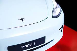 Tesla Model 3, close-up view of logo
