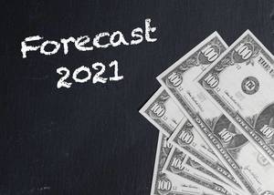 Text FORECAST 2021 (Prognose 2021) neben Dollarnoten auf schwarzem Hintergrund