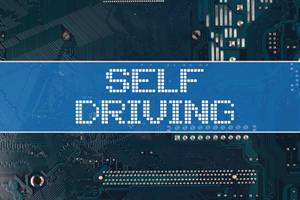 Text Self Driving vor einer elektronischen Leiterplatte als Hintergrund