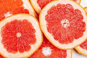Texture of a ripe grapefruit slice, closeup (Flip 2020)