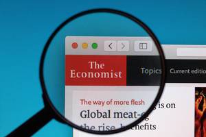 The Economist logo under magnifying glass
