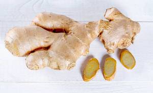 The fresh ginger root on white background