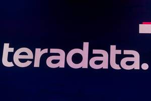 The logo of Teradata, the cloud analytics company delivering Pervasive Data Intelligence, on the large screen on the Digital X stage in Cologne