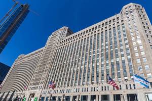 The Merchandise Mart by the Chicago River was, at the time of its opening, the largest building in the world