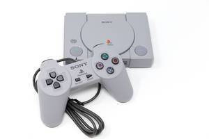 The Playstation Classic mini console on white background