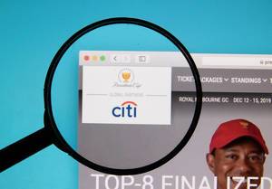 The Presidents Cup logo on a computer screen with a magnifying glass