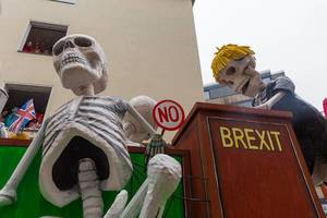 The slowness of the Brexit process is the focus of a satirical wagon of the Cologne Carnival Rose Monday Parade, with Boris Johnson turning into a skeleton while addressing MPs (also skeletons) at the House of Commons