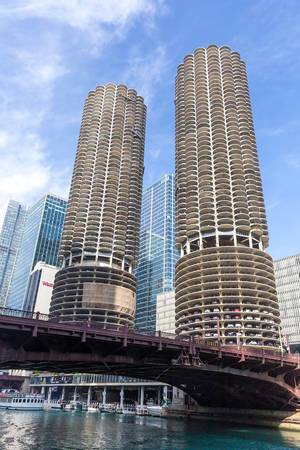 The two identical 65-story apartment towers of the Marina City complex designed by Bertrand Goldberg in Chicago, seen from the other side of the river