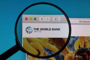 The World Bank logo under magnifying glass