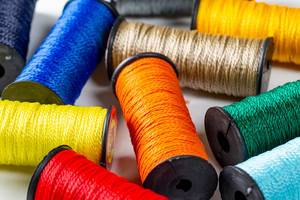 Threads for sewing of different colors