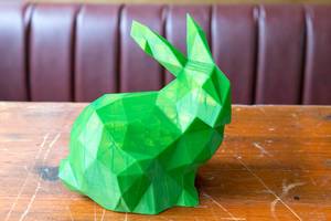 Three-dimensional print of a green Easter bunny from the 3D printer