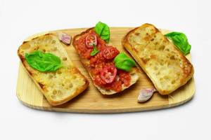 Toasts with tomatoes and garlic