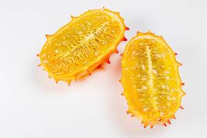 Top view, halves of kiwano fruit on a white background (Flip 2020)