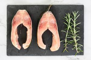Top view of Carp Fish slices with Rosemary