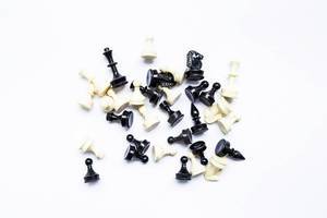 Top view of chess figures on white background
