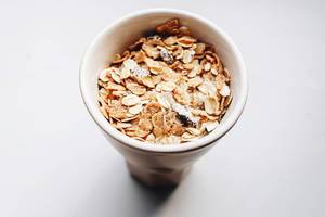 Top view of muesli in a cup. Close up