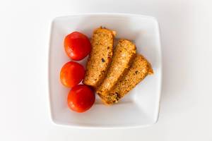 Top view of three organic tofu slices "Rosso" by Taifun for a meatless diet