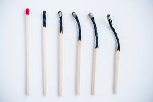 Top View Photo showing stages of burning match on White Background