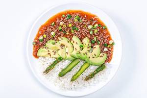Top view. Rice with tomato-Apple sauce, asparagus, avocado and flax seeds on white background (Flip 2019)
