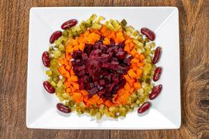 Top view salad with boiled beets, carrots, beans and pickles (Flip 2019)