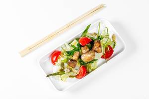 Top view salad with vegetables and mushrooms on a white background with chopsticks (Flip 2019)