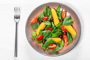 Top view vegetable salad with dogwood berries (Flip 2019)