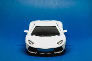 Toy car isolated on blue background