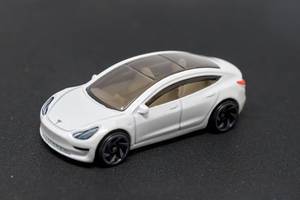 Toy car: side view of the Hot Wheels Tesla Model 3 version