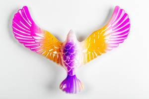 Toy eagle with spread wings on a white background