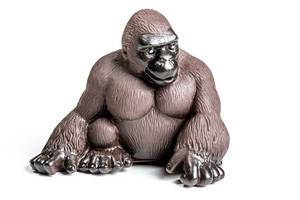 Toy gorilla on white background