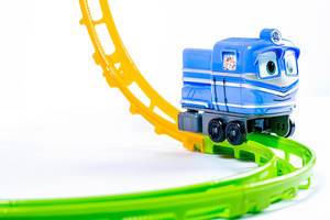 Toy train on plastic railway (Flip 2019)
