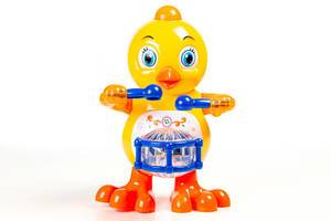 Toy yellow chicken with a drum on a white background (Flip 2020)