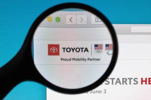 Toyota logo under magnifying glass